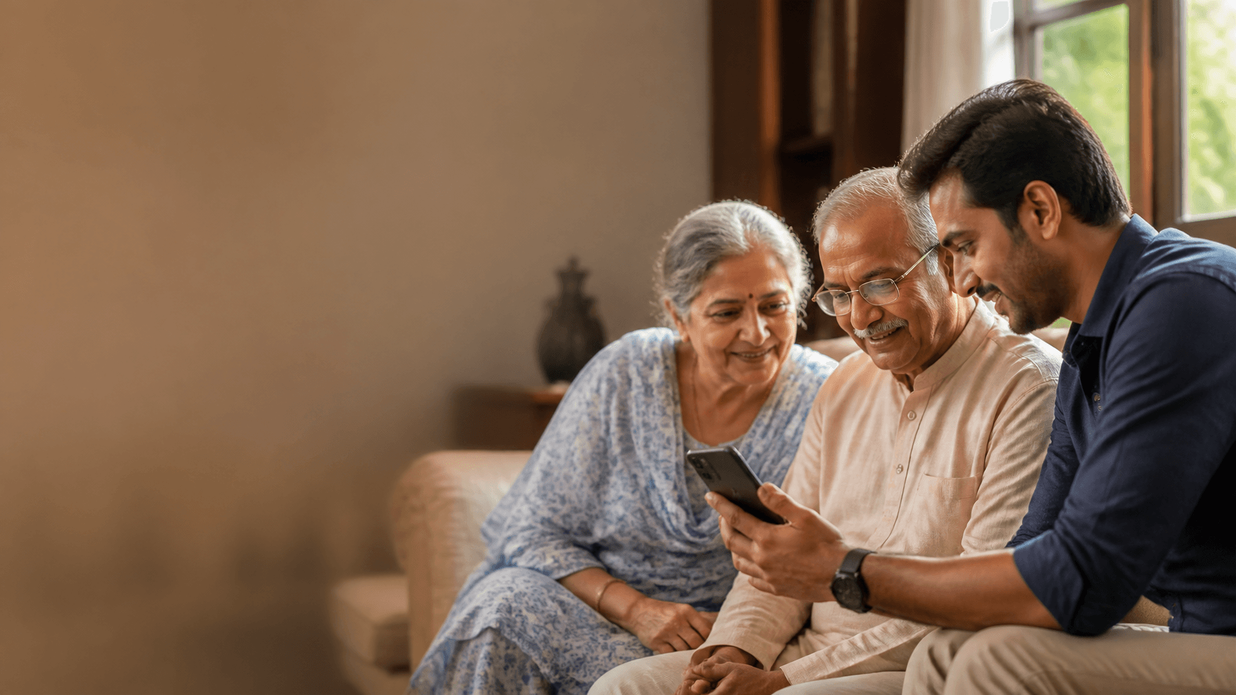 Adult son helping elderly parents confidently manage health records on MyHealthOS